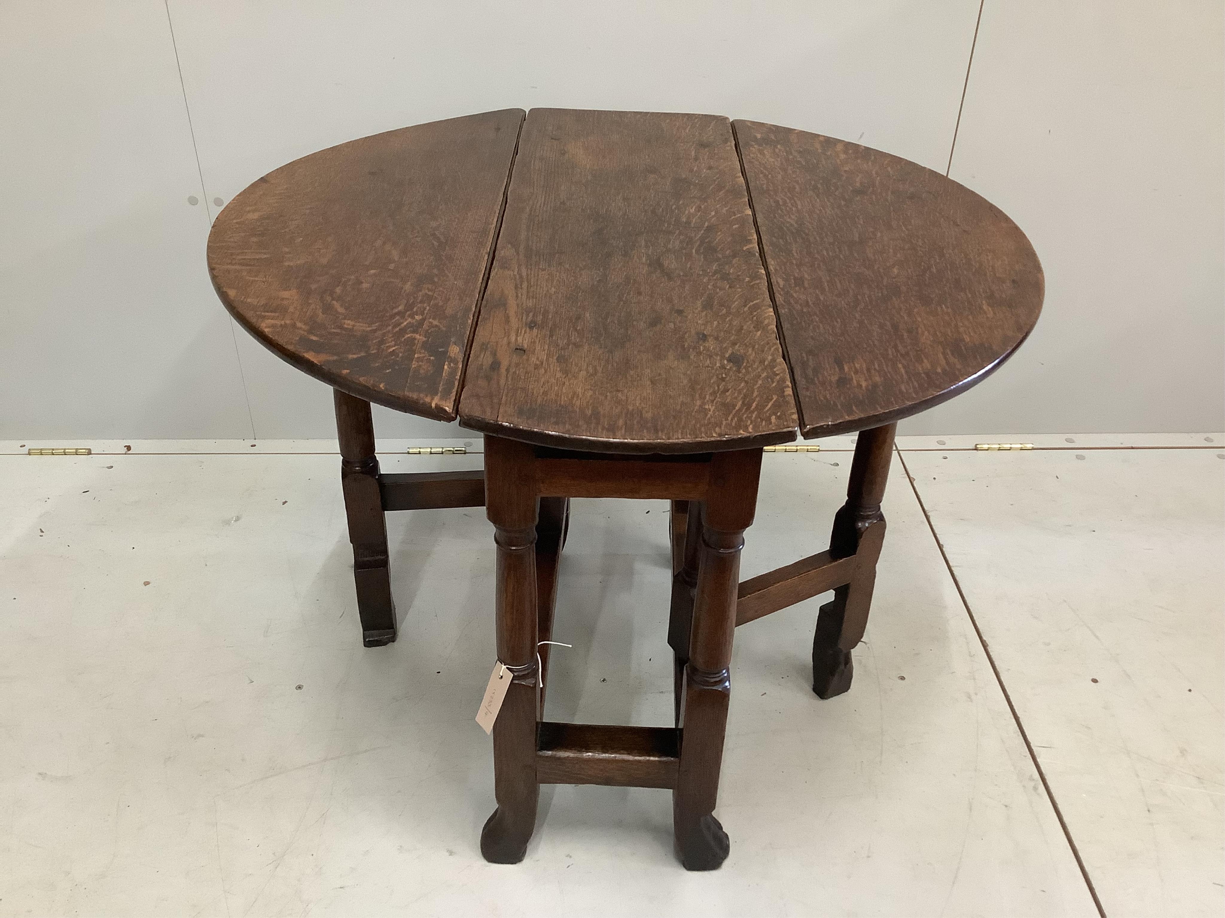 A small late 17th / early 18th century oak gateleg table, width 87cm extended, depth 82cm, height 71cm. Condition - good
